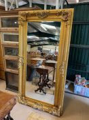 Large contemporary gilt framed bevel edged mirror, approx 98cm x 184cm