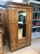 French blond wood double wardrobe with bevelled glass mirror, drawer to bottom A/F, approx 111cm x