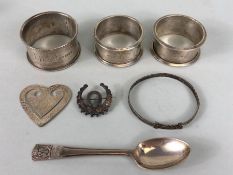 Collection of hallmarked silver items to include Christening bracelet three napkin rings a