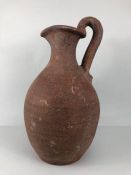 Terracotta jug, large unglazed terracotta jug in the style of a Greco Roman wine pitcher