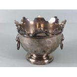 Silver English hallmarked slop bowl, scalloped rim with cherub faces and lion mask side rings