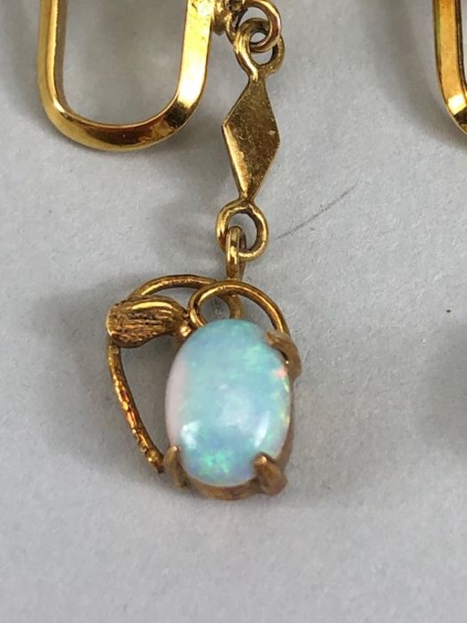 Pair of 14ct Gold drop earrings each set with two cushion cut Opals (total drop approx 32mm) - Image 2 of 13
