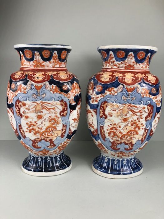 Japanese Imari ware, 2 Imari vases (a pair) painted with designs of Ho Ho birds and symbols of - Image 2 of 16