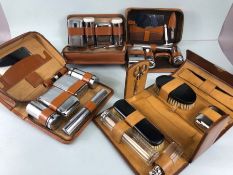 Collection of four vintage grooming kits