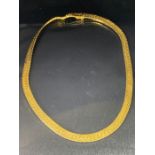 14k Gold Rolled Serpentine Necklace approx 38cm in length and 6mm wide total weight approx 32.6g