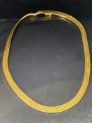 14k Gold Rolled Serpentine Necklace approx 38cm in length and 6mm wide total weight approx 32.6g