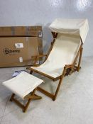 Pair of Edwardian style modern steamer / deck chairs with canopies and folding footstools, in
