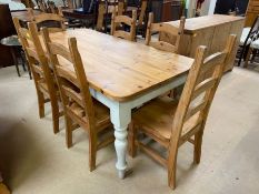 Modern pine Farmhouse style dining table with painted legs approximately 183cm x 90cm x 80cm, and