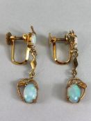 Pair of 14ct Gold drop earrings each set with two cushion cut Opals (total drop approx 32mm)