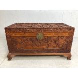 Camphor wood chest, Chinese Camphor wood chest deeply carved with scenes of warriors in battle, on