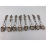 Antique silver a collection of eight 925 marked silver spoons the handles formed as 18th century