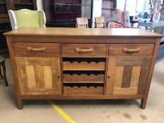 Oak sideboard with three drawers, two cupboards and integrated pull-out wine racks x 3, approx 157cm