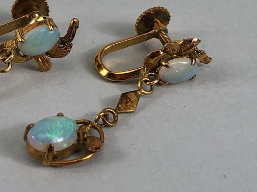 Pair of 14ct Gold drop earrings each set with two cushion cut Opals (total drop approx 32mm) - Image 6 of 13