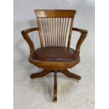 Oak slat back captains chair with padded seat, stud detailing, on castors