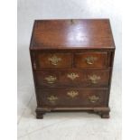 Antique Furniture, Antique oak bureau of small proportions, the base on bracket feet with 2