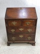 Antique Furniture, Antique oak bureau of small proportions, the base on bracket feet with 2