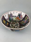 Oriental dish, Chinese style Ceramic dish with painted decoration of courtiers, birds and flowers