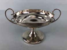 Silver hallmarked tazza with scroll handles approx 7cm tall hallmarked for Chester on weighted base