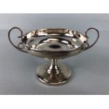 Silver hallmarked tazza with scroll handles approx 7cm tall hallmarked for Chester on weighted base