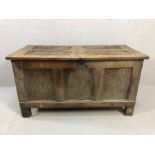 Eighteenth Century panelled oak coffer with original hinges, opening to reveal small integral hinged