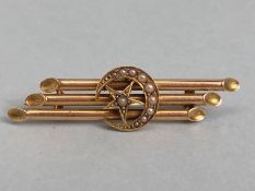 15ct Gold three bar brooch set with a crescent Moon and a star both with seed pearls approx 45mm