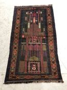 Oriental Rug, Hand Knotted Wool Old Baluchi Rug with geometric design approximately 136 x 79cm.