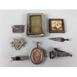 Silver items , a collection of silver hallmarked objects to include a dog pin cushion, cheroot