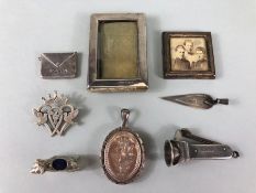 Silver items , a collection of silver hallmarked objects to include a dog pin cushion, cheroot