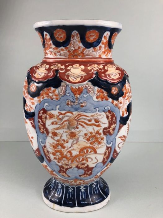 Japanese Imari ware, 2 Imari vases (a pair) painted with designs of Ho Ho birds and symbols of - Image 6 of 16