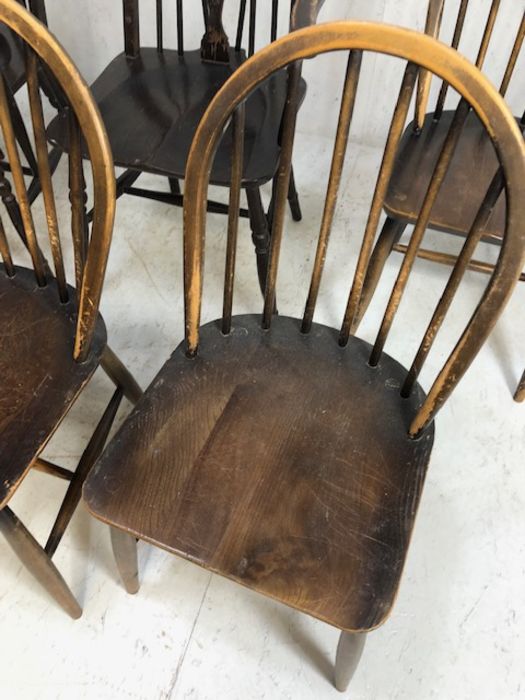 Six stick back Ercol dining chairs, and two wheel back carver chairs - Image 9 of 12