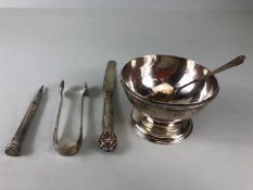 Antique silver, a collection of miscellaneous silver to include, English hallmarked sugar tongs,