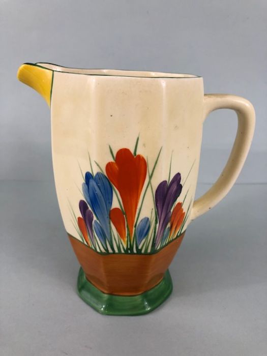 Clarice Cliff, A Bizarre ware Octagonal Crocus pattern jug for Wilkinson Ltd England,