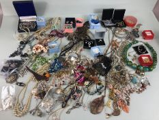 Costume jewellery, a large collection of costume jewellery to include bangles, earrings, pendants,