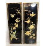 Oriental lacquered panels, two black and gold lacquered wall panels decorated with birds and flowers