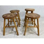 Wooden stools, 4 vintage pine stools with round seats on round tapering legs approximately 45cm high