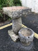 Stone garden bird bath, approx 57cm tall and a garden urn-style pot