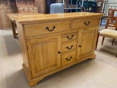 Contemporary polished oak sideboard by 'Shire Oak', with five drawers and two cupboards, approx