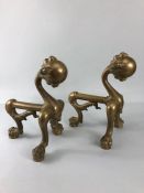 Brass fire dogs, a pair of Ball and Claw fire dogs on 3 claw and ball feet approximately 27cm high