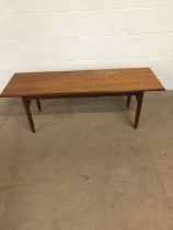 Mid century furniture, 1970s long coffee table on round tapered legs approximately 120 x 40 x 41cm