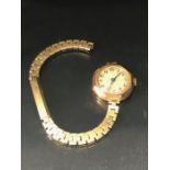 9ct Gold cased Octagonal cocktail watch (winds and runs) with gold coloured strap A/F