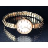 9ct Gold Cased Rotary Wristwatch with Gold numbers on a gold coloured strap in original case