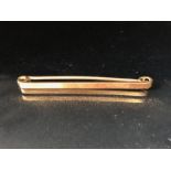 9ct Gold Bar brooch hallmarked for maker M&C approx 5cm in length and 2.2g