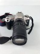 Photographic interest, Canon EOS 500 automatic 35mm camera with 100-300 mm zoom lens