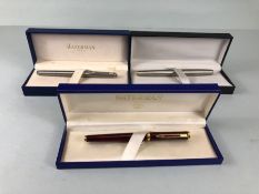 Fountain pens, two Waterman fountain pens one red lacquered with 18ct nib in box, the other brush