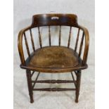 Smokers or elbow chair with turned spindles and pierced seat