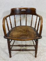 Smokers or elbow chair with turned spindles and pierced seat