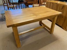 Contemporary polished oak dining table, with stretcher, approx 135cm x 89cm x 75cm tall
