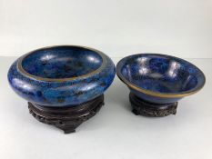 Chinese Cloisonne, 2 Cobalt blue Cloisonne Enamel bowls on wooden stands, the larger approximately