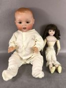 Antique Dolls, a large Armand Marseille bay doll , Stamped A.M Germany 351-/9.K, in a modern baby