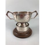 Hallmarked Twin Handled Silver trophy on wooden and silver banded plinth engraved "PIG HUSBANDARY